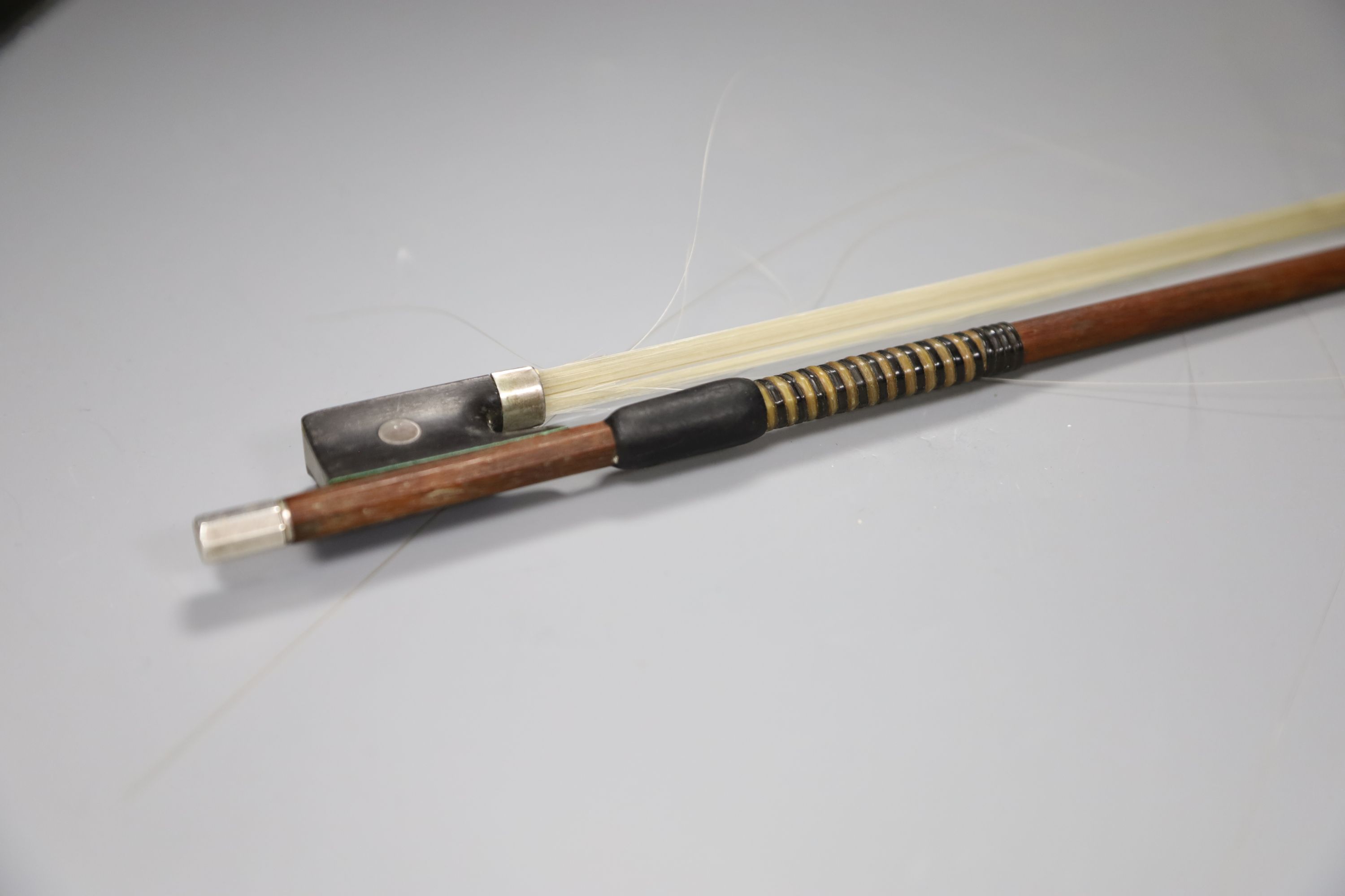 A 19th century German silver-mounted violin bow with original lapping